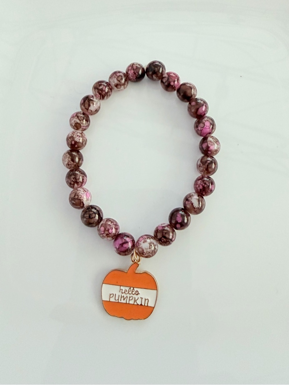 Pink Marbled Bead Bracelet with Orange 'Hello Pumpkin' Charm